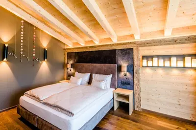 Ein Bett oder Betten in einem Zimmer der Unterkunft Beim Hochfilzer Superior 4 Sterne