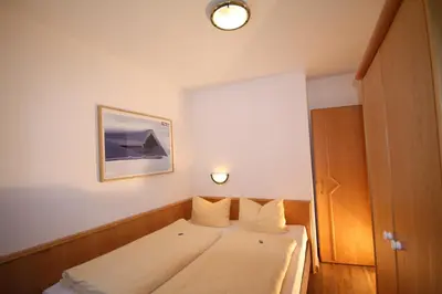 Ein Bett oder Betten in einem Zimmer der Unterkunft Kalle's Familien-Appartements