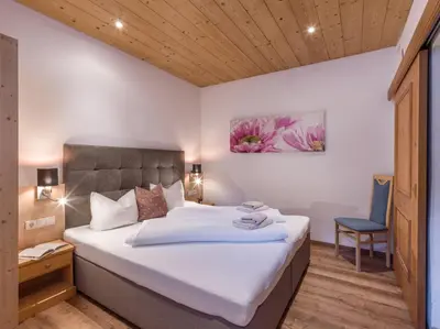 Ein Bett oder Betten in einem Zimmer der Unterkunft Kalle's Familien-Appartements