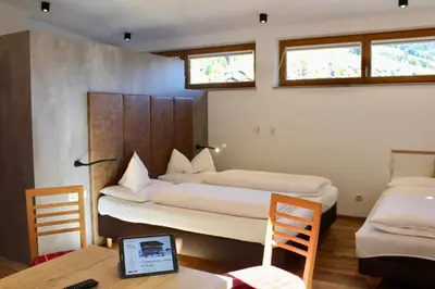 Ein Bett oder Betten in einem Zimmer der Unterkunft Pension Norika