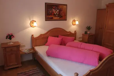 Ein Bett oder Betten in einem Zimmer der Unterkunft Apart Edelweiss