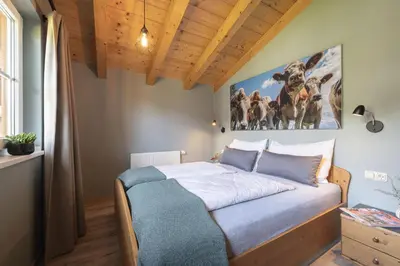 Ein Bett oder Betten in einem Zimmer der Unterkunft Feriendorf Wallenburg