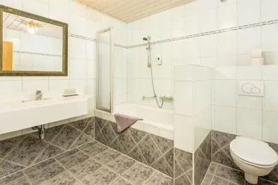 Ein Badezimmer in der Unterkunft Alpen Wohlfühlhotel Dörflwirt
