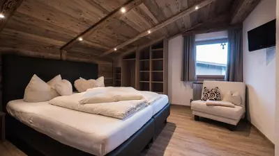 Ein Bett oder Betten in einem Zimmer der Unterkunft Apart Tyrol