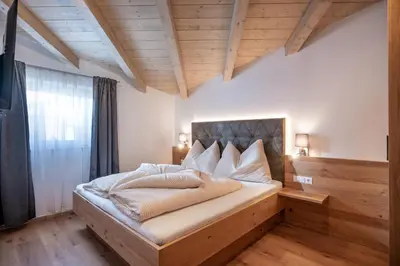Ein Bett oder Betten in einem Zimmer der Unterkunft Apart Platzer
