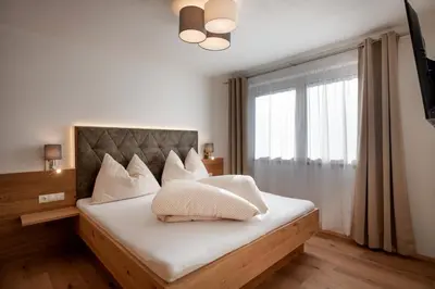 Ein Bett oder Betten in einem Zimmer der Unterkunft Apart Platzer