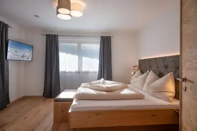 Ein Bett oder Betten in einem Zimmer der Unterkunft Apart Platzer