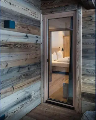 Ein Bett oder Betten in einem Zimmer der Unterkunft Kitzbuheler Alpen Penthouse Hollersbach