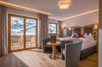 Ein Bett oder Betten in einem Zimmer der Unterkunft Hotel Bichlingerhof