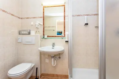 Ein Badezimmer in der Unterkunft Hotel Bichlingerhof
