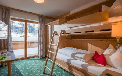 Ein Bett oder Betten in einem Zimmer der Unterkunft Hotel Bichlingerhof