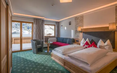Ein Bett oder Betten in einem Zimmer der Unterkunft Hotel Bichlingerhof