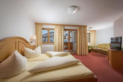 Ein Bett oder Betten in einem Zimmer der Unterkunft Der Schwendterwirt