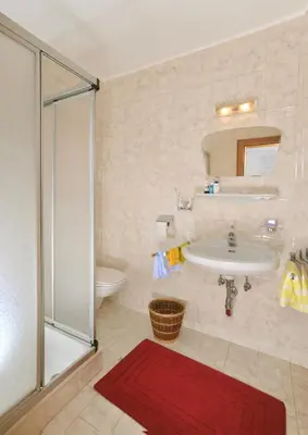 Ein Badezimmer in der Unterkunft Der Schwendterwirt