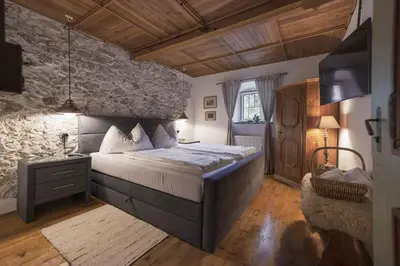 Ein Bett oder Betten in einem Zimmer der Unterkunft Bauernhaus-Schloss Wagrain