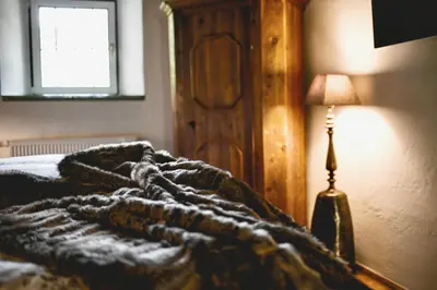 Ein Bett oder Betten in einem Zimmer der Unterkunft Bauernhaus-Schloss Wagrain