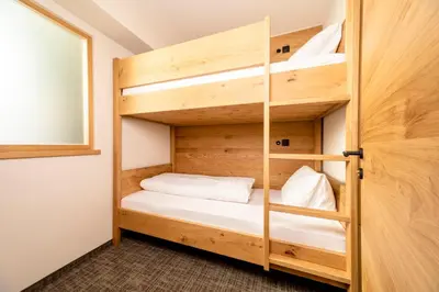 Ein Bett oder Betten in einem Zimmer der Unterkunft Hotel Stockerwirt