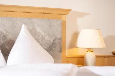 Ein Bett oder Betten in einem Zimmer der Unterkunft Landhaus Dorfbäck
