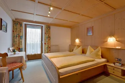 Ein Bett oder Betten in einem Zimmer der Unterkunft Ferienwohnungen Kainer