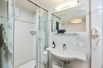 Ein Badezimmer in der Unterkunft Hotel Gasthof Siggen