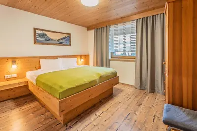 Ein Bett oder Betten in einem Zimmer der Unterkunft Appartements-Kaltenbach