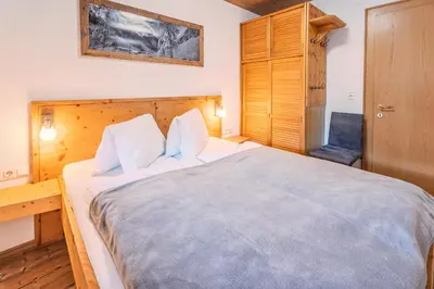 Ein Bett oder Betten in einem Zimmer der Unterkunft Appartements-Kaltenbach