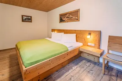 Ein Bett oder Betten in einem Zimmer der Unterkunft Appartements-Kaltenbach