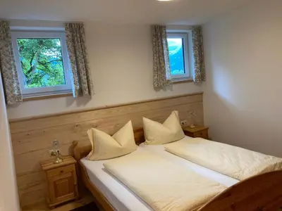 Ein Bett oder Betten in einem Zimmer der Unterkunft Hanserhof