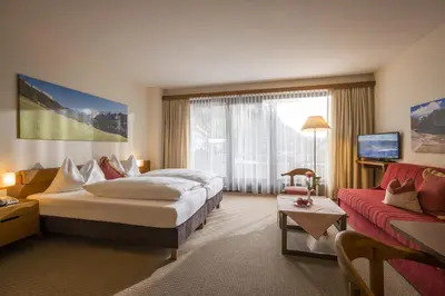 Ein Bett oder Betten in einem Zimmer der Unterkunft Aparthotel Andreas Hofer