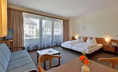 Ein Bett oder Betten in einem Zimmer der Unterkunft Aparthotel Andreas Hofer