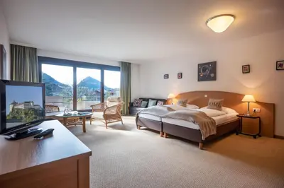 Ein Bett oder Betten in einem Zimmer der Unterkunft Aparthotel Andreas Hofer