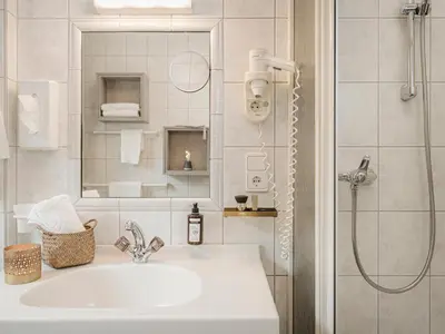 Ein Badezimmer in der Unterkunft Hotel Post