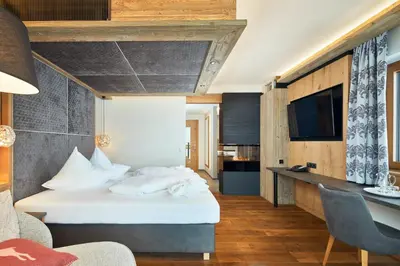 Ein Bett oder Betten in einem Zimmer der Unterkunft Hotel Wöscherhof - 4 Sterne Superior