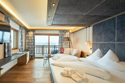 Ein Bett oder Betten in einem Zimmer der Unterkunft Hotel Wöscherhof - 4 Sterne Superior