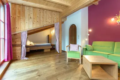 Ein Bett oder Betten in einem Zimmer der Unterkunft Brandstatthof Leogang