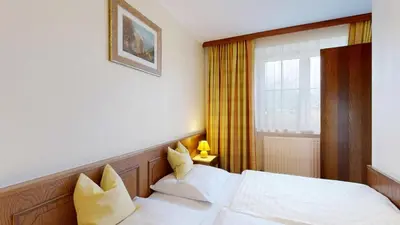 Ein Bett oder Betten in einem Zimmer der Unterkunft Landhaus Foidl