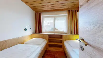 Ein Bett oder Betten in einem Zimmer der Unterkunft Landhaus Foidl