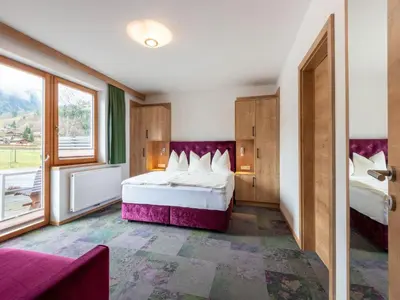 Ein Bett oder Betten in einem Zimmer der Unterkunft Apartment in Wald near Zillertal Arena