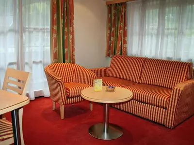 Ein Sitzbereich in der Unterkunft Landhotel Kaserer
