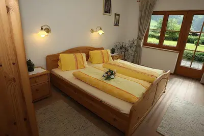 Ein Bett oder Betten in einem Zimmer der Unterkunft Ferienwohnungen Sunshine Stumm