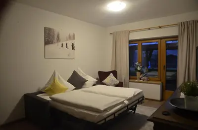 Ein Bett oder Betten in einem Zimmer der Unterkunft Ferienwohnungen Sunshine Stumm