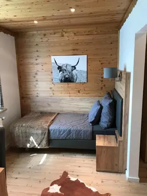 Ein Sitzbereich in der Unterkunft Golf & Ski Chalet