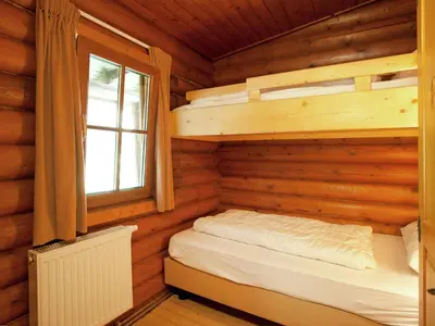Ein Bett oder Betten in einem Zimmer der Unterkunft Chalet in Wörgl near SkiWelt Wilder Kaiser