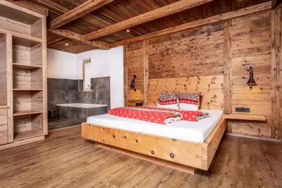 Ein Bett oder Betten in einem Zimmer der Unterkunft Alpen Chalet Wohnung 