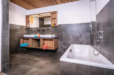 Ein Badezimmer in der Unterkunft Alpen Chalet Wohnung 
