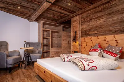 Ein Bett oder Betten in einem Zimmer der Unterkunft Alpen Chalet Wohnung 