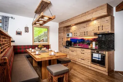 Küche/Küchenzeile in der Unterkunft Alpen Chalet Wohnung 