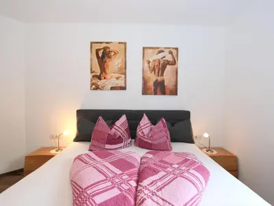Ein Bett oder Betten in einem Zimmer der Unterkunft Apartment Wildbachl by Interhome