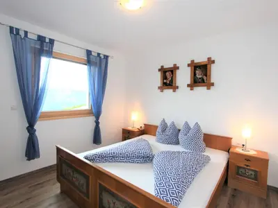 Ein Bett oder Betten in einem Zimmer der Unterkunft Apartment Wildbachl by Interhome