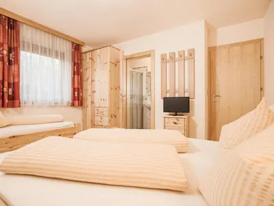 Ein Bett oder Betten in einem Zimmer der Unterkunft Deluxe Apartment Sonnseite